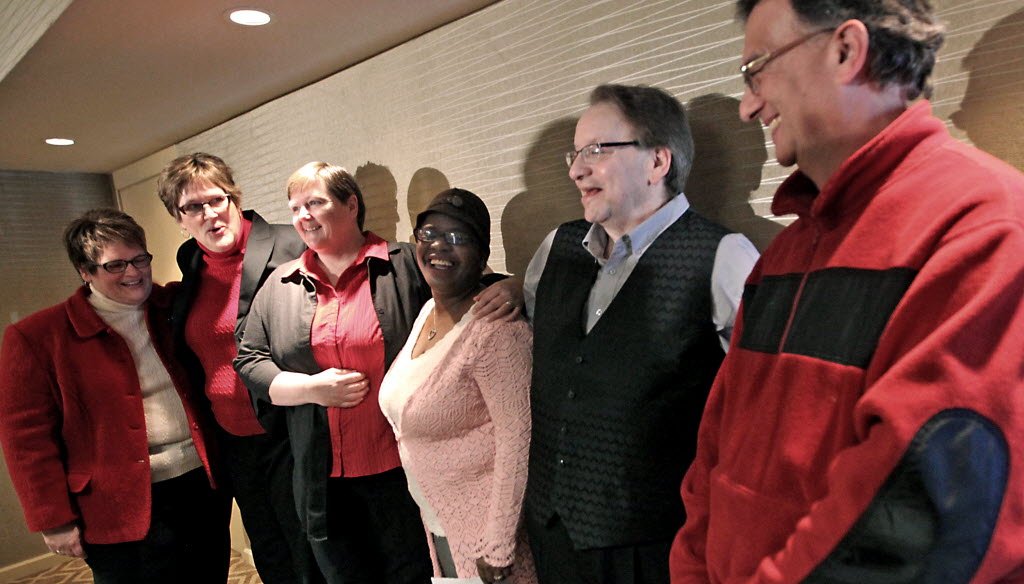 Plaintiffs in a federal lawsuit challenging Wisconsin's ban on gay marriage appear during a press conference at the Concourse Hotel in Madison, Feb. 3, 2014. AP