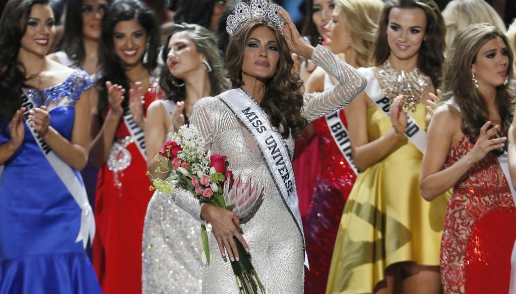 Miss Universe 2013 Gabriela Isler, from Venezuela, adjusts her crown after winning the pageant in Moscow, Russia, on Nov. 9, 2013. (AP)