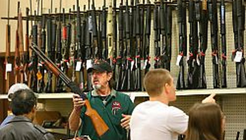 Customers line up to buy guns at Adventure Outdoors in Smyrna, Ga. on Jan. 7, 2013. Gun sales were brisk and the store was selling out of ammunition on a daily basis.