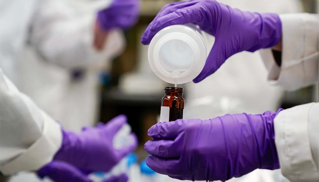 A water researcher pours a water sample for drinking water and PFAS research , Feb. 16, 2023, at the U.S. Environmental Protection Agency Center for Environmental Solutions and Emergency Response in Cincinnati. (AP)