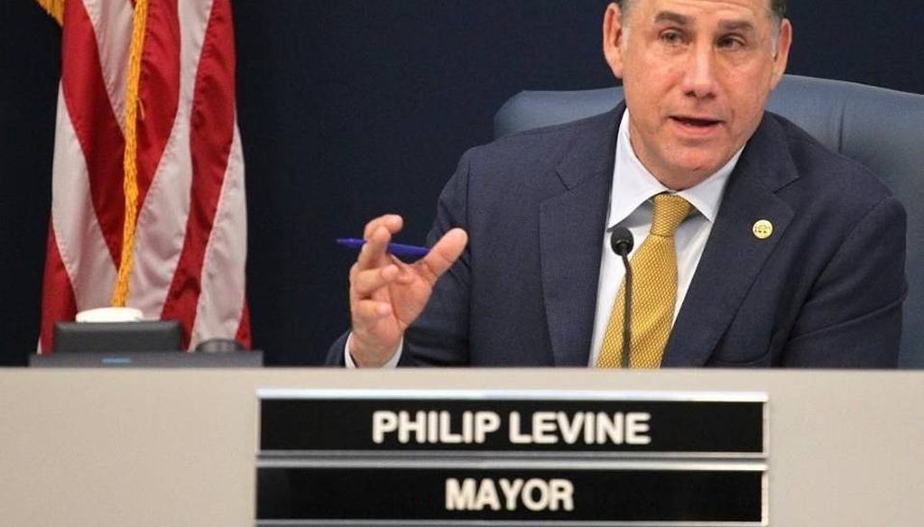 Miami Beach Mayor Philip Levine, photographed at a Miami Beach City Commission meeting, has Levine fired back at Airbnb. (Miami Herald)