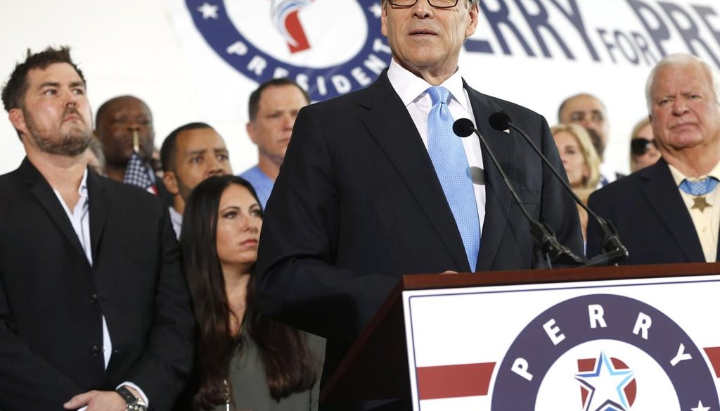 Former Texas Gov. Rick Perry announces his 2016 White House run surrounded by supporters on June 4, 2015, in Dallas. Getty.