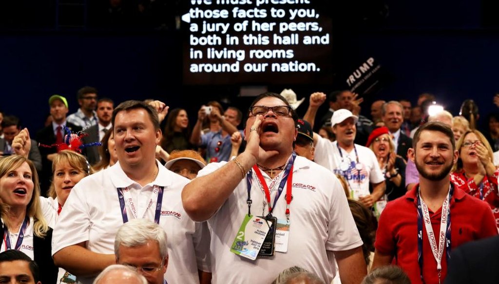 A screen projects the speech of New Jersey Gov. Chris Christie as delegates participate during his talk on the second day of the Republican National Convention on July 19, 2016 at the Quicken Loans Arena in Cleveland, Ohio. (Getty)