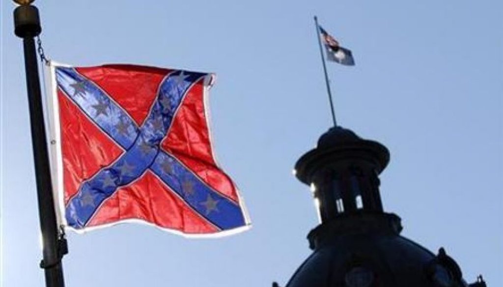 The Confederate battle flag flies at a memorial in front of the South Carolina state House. (AP)