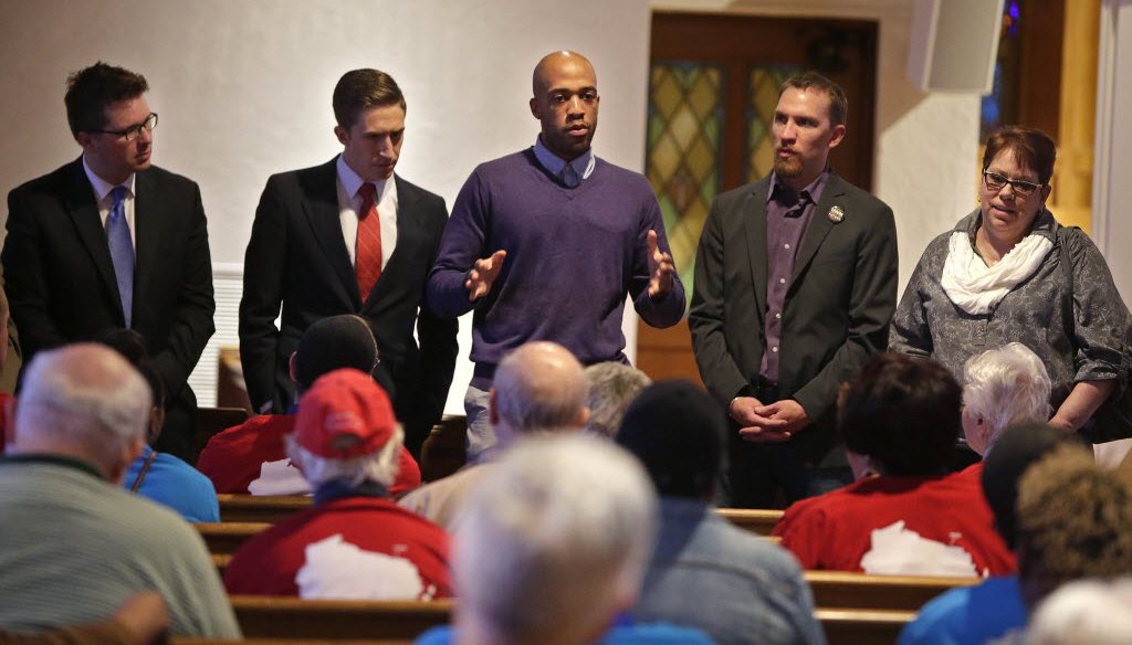 State Rep. Mandela Barnes, D-Milwaukee, talks about the legislative efforts on various issues important to the faith community, following a march to the Capitol for a lobbying day.