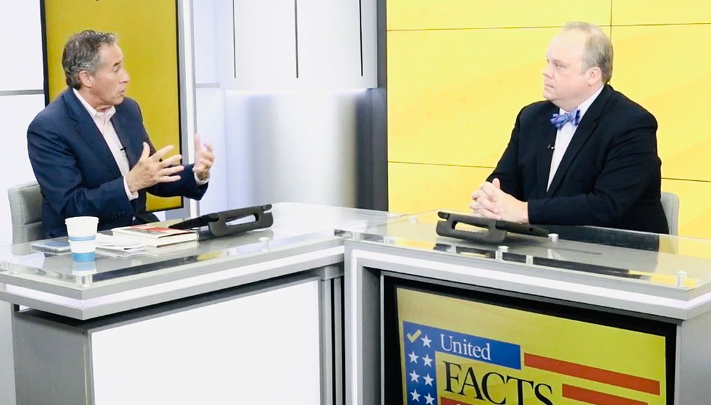 Poynter Institute for Media Studies President Neil Brown, left, and former Fox News Political Editor Chris Stirewalt discuss the media’s role in fighting disinformation on Sept. 28, 2022, during United Facts of America.