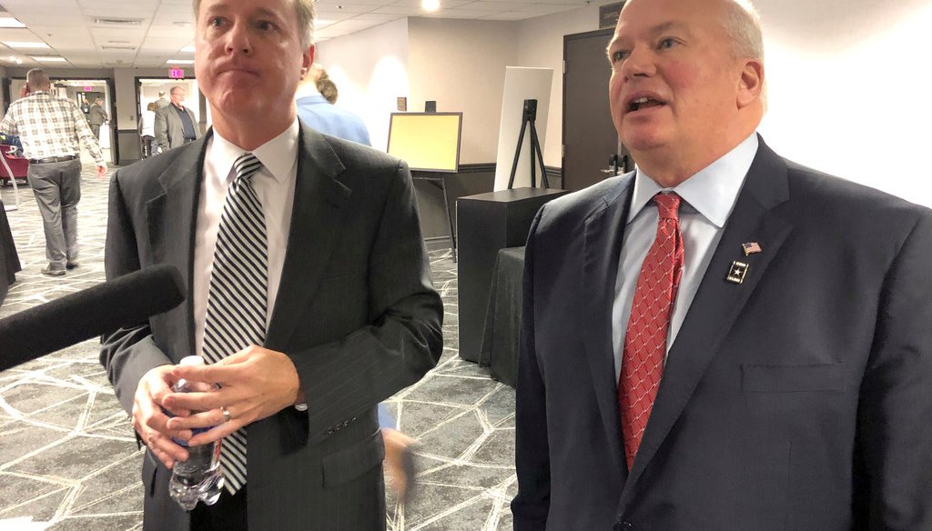 Wisconsin Assembly Speaker Robin Vos, left, and Senate Majority Leader Scott Fitzgerald speak to reporters in Madison about the coronavirus pandemic. (AP Photo/Scott Bauer)