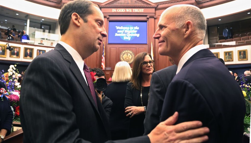 Florida Senate President Joe Negron, R- Stuart, greets Florida Governor Rick Scott on the floor of the Senate during the first day of the 2017 session. (Scott Keeler | Times)